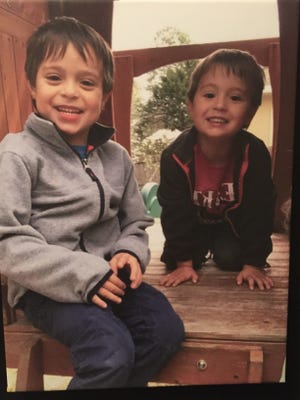 Noah Perillo (left) is seen playing with his younger brother. [SPECIAL TO THE DAILY NEWS]