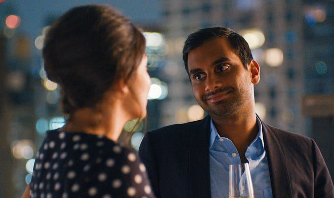 This image released by Netflix shows Aziz Ansari in a scene from, “Master of None.” Ansari is nominated for an Emmy Award for outstanding lead actor in a comedy series, the sole Asian-American acting nominee. (Netflix via AP)