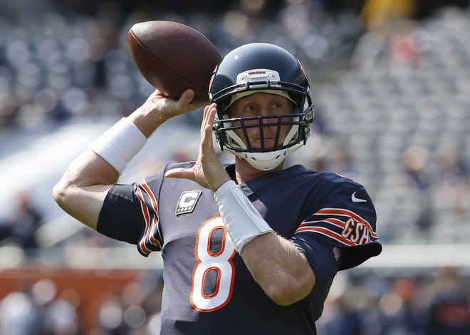 Chicago Bears quarterback Mike Glennon (8) warms up before a game against the Atlanta Falcons, Sunday, in Chicago. NAM Y. HUH/THE ASSOCIATED PRESS