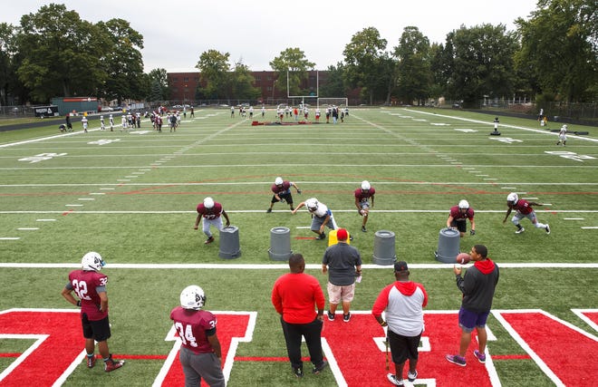 The Springfield High School football team practices on the turf at the school's New Street Athletic Complex, Wednesday, Sept. 13, 2017, in Springfield. [Justin L. Fowler/The State Journal-Register]
