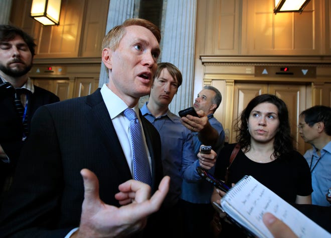 Sen. James Lankford, R-Oklahoma City, speaks to reporters recently on Capitol Hill in Washington. [AP File Photo]