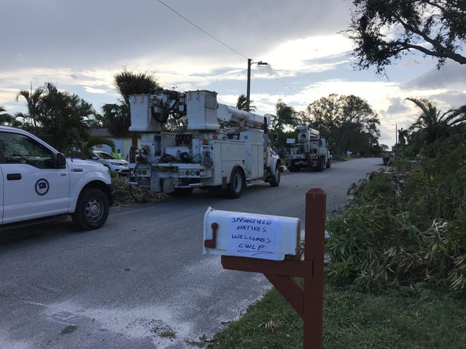 Springfield native Roger Latham, who 12 years ago moved to Florida with his wife Tammie, shared this photo of CWLP trucks on his street this week in Lake Worth, Florida. CWLP sent crews to Florida to help restore power after Hurricane Irma. (Photo courtesy of Roger Latham)