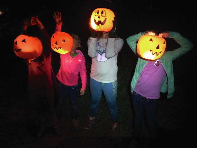 Several youth participants from last year’s Moonlight Harvest event are shown having some “pumpkin” fun. Photo Contributed