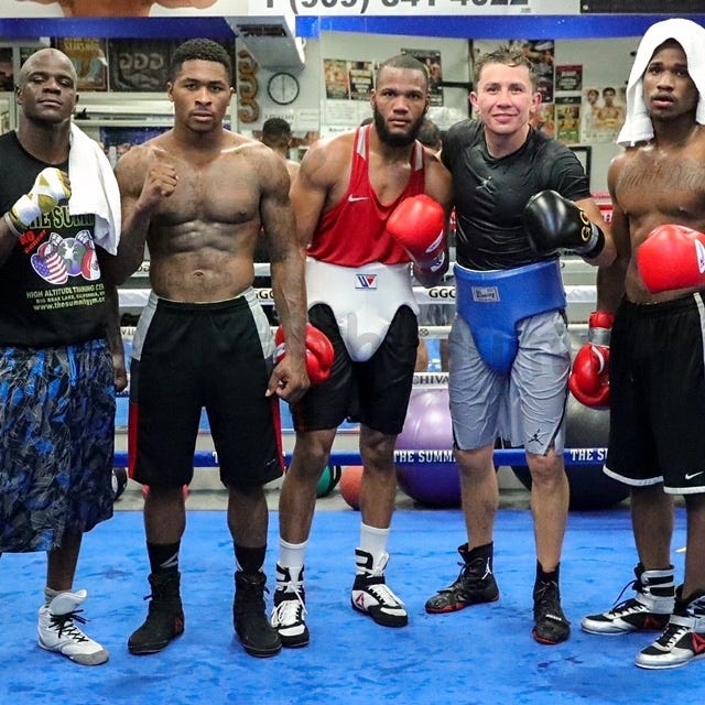 From left, Kenny McNeil, Deon Nicholson, Julian Williams, Gennady Golovkin and Kyron Davis pose for a photo during a recent Golovkin's training session. Nicholson, from Tuscaloosa, was a sparring partner for Golovkin, who will fight Canelo Alvarez for the world middleweight championship on Saturday. [Submitted photo]