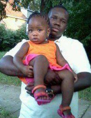 This undated family photo supplied by Christina Wilson shows Anthony Lamar Smith holding his daughter Autumn Smith. Anthony Lamar Smith was killed in 2011 during a confrontation with police. A judge may be close to a ruling in the case against Former St. Louis police officer Jason Stockley, who is charged with first-degree murder and armed criminal action in the December 2011 shooting death of Smith. Gov. Eric Greitens says he’s has put the National Guard on standby in case unrest breaks out. (Family photo courtesy Christina Wilson via AP)