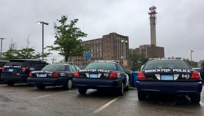 Brockton police cruisers lined up in the parking lot of the Brockton Police Department on Tuesday, July 25, 2017.