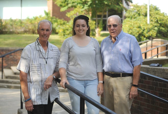 Ernest Oliveira, left, and Richard Coughlin are co-mentors of Cape Cod Community College student Emeline Janowicz through the Advocates for a Community College Education scholarship program. [Merrily Cassidy/Cape Cod Times]
