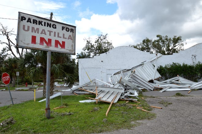 The Umatilla Inn on State Road 19 was damaged during Hurricane Irma on Monday in Umatilla. [WHITNEY LEHNECKER / DAILY COMMERCIAL]