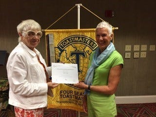 Four Seasons Toastmasters President, left, presents Judy Groff with the prestigious Advanced Communicator Bronze Award. Judy has served Four Seasons as vice president of education and served as secretary and on a task force for the "Taste of Toastmasters" event on Aug. 23. [PROVIDED PHOTO]