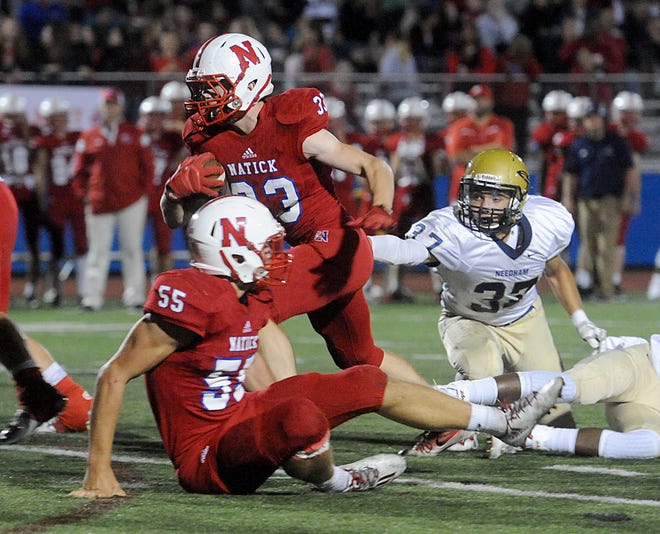 Natick's Tim Ramstrom, seen here last week against Needham, had a key interception in the fourth quarter on Saturday in the Redhawks' 28-0 win over Newton North. [Daily News and Wicked Local Staff File Photo/Art Illman]