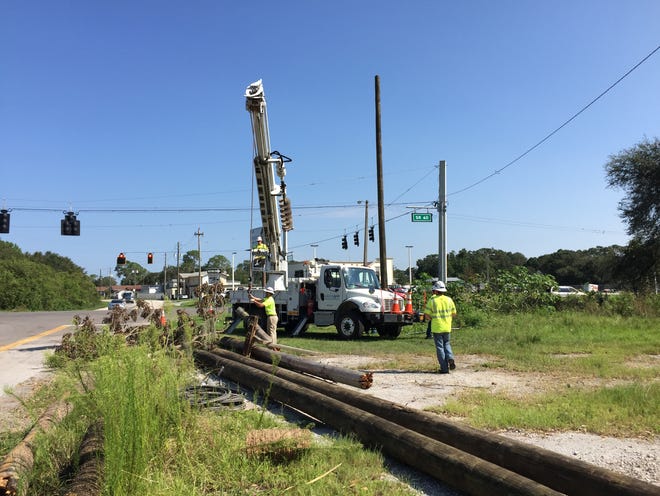 National Grid workers helping to restore power in Central Florida. [Photo/National Grid]