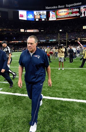 Bill Belichick walks off the field after an NFL football game against the New Orleans Saints in New Orleans, Sunday, Sept. 17, 2017. The Patriots won 36-20.