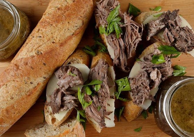Slow cooker French dip sandwiches might bring tears to your eyes.