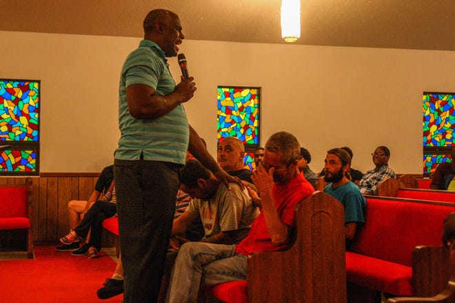 Guests get emotional as Rev. Jeffrey Dove discusses New Smyrna Beach's approach to caring for homeless people during Hurricane Irma. Dove joined others at a community meeting Thursday at Allen Chapel AME Church, where he is pastor, in calling for the city manager's removal. [News-Journal/Lola Gomez]