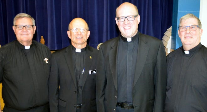 Deacon John Wielgos, Deacon Al sosinski, Very Reverend Mark Vyverman, and Deacon Tim Kistka.