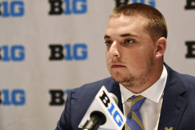 FILE - In this July 25, 2017, file photo, Michigan offensive line Mason Cole speaks during Big Ten football media days in Chicago. Cole has a shot to become Michigan's first offensive lineman to start 51 games in his career. The left tackle is not focused on the potential feat because he's trying to focus on helping the eighth-ranked Wolverines win Saturday at Purdue. (AP Photo/G-Jun Yam, File)