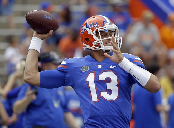 Florida quarterback Feleipe Franks warms up before the Gators' game against Tennessee. [JOHN RAOUX/THE ASSOCIATED PRESS]