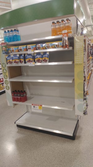 Some of the shelves at the Publix on Ridgewood Avenue in Holly Hill remained bare on Tuesday thanks to Hurricane Irma, but officials say it's likely to be a short-term situation. [News-Journal/Jim Abbott]