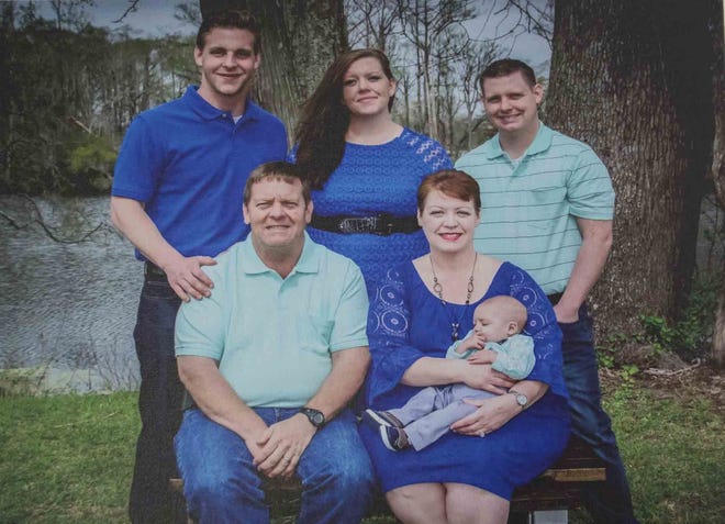 This 2016 family portrait shows the Fothergill family in happier times. Matt is standing, at left.