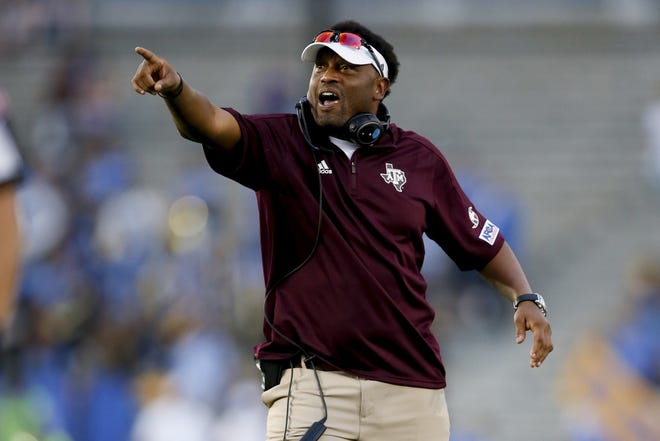 Texas A&M head coach Kevin Sumlin gestures during a game against UCLA on Sept. 3 in Pasadena, Calif. Sumlin was already on the hot seat before the team squandered a 34-point lead in a loss to UCLA in its opener. [AP Photo / Danny Moloshok, File]
