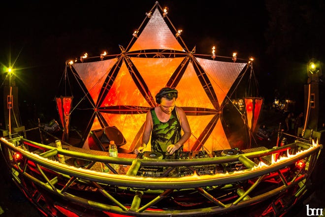 DJ Paul Hunt, known as Illterror, commands the controls during Earthdance 2016. [PHOTO PROVIDED]