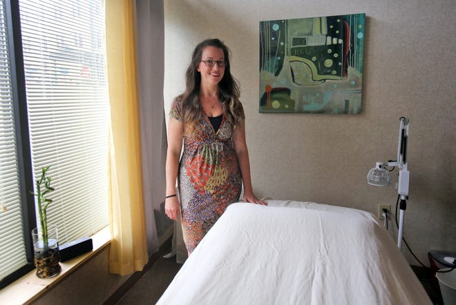 Autum Kirgan offers acupuncture, Gua Sha and cupping at All Seasons Acupuncture. The business will have a grand open house Friday night. [Brittany Randolph/The Star]