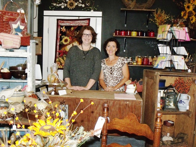 Tandra Dennis, left, and Antonette Bunett have an affinity for what looks good in the old, often rusty and chipped, as well as the shabby chic and pretty. [Alison Minard for The Fayetteville Observer]