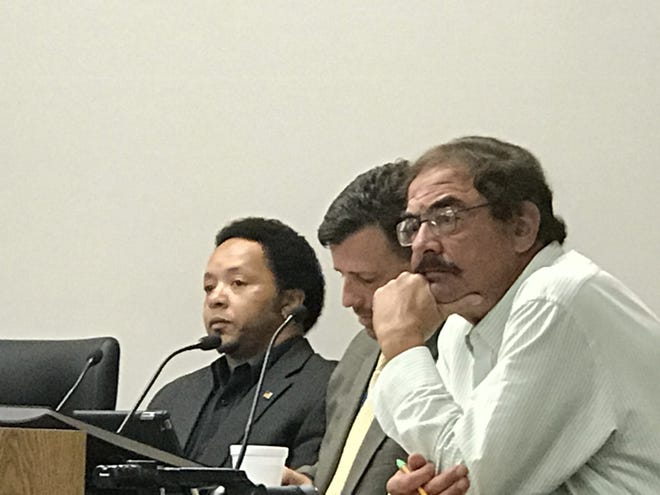 Ward 2 Director Andre Good, Ward 3 Director Mike Lorenz and Ward 4 Director George Catsavis hear ordinance information Tuesday, Sept. 19, 2017, at a Board of Directors meeting. [ALEX GOLDEN/TIMES RECORD]