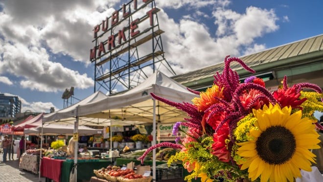 Pike Place Market is one of the main tourist draws in the city of Seattle. Contributed by Visit Seattle