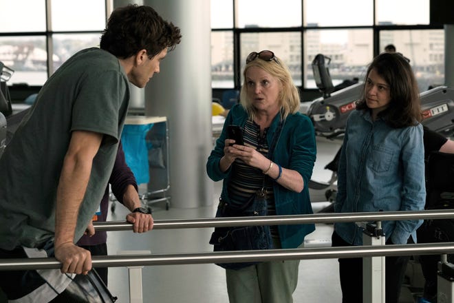 Jake Gyllenhaal, Miranda Richardson, and Tatiana Maslany in "Stronger." [Scott Garfield]