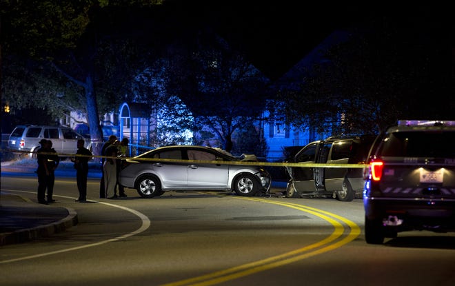 State Police and Framingham Police conduct their investigation after a fatal two-vehicle accident in the area of 171 Water St. in Framingham, Sept. 21, 2017.  [Daily News Staff Photo/John Walker]