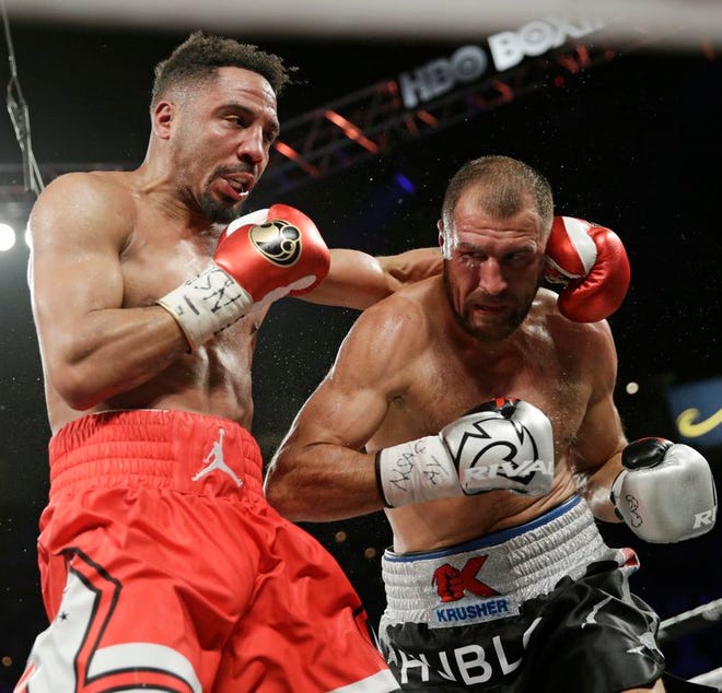 Andre Ward, left, fights Sergey Kovalev during a light heavyweight championship boxing match Saturday, June 17, 2017, in Las Vegas. (AP Photo/John Locher)