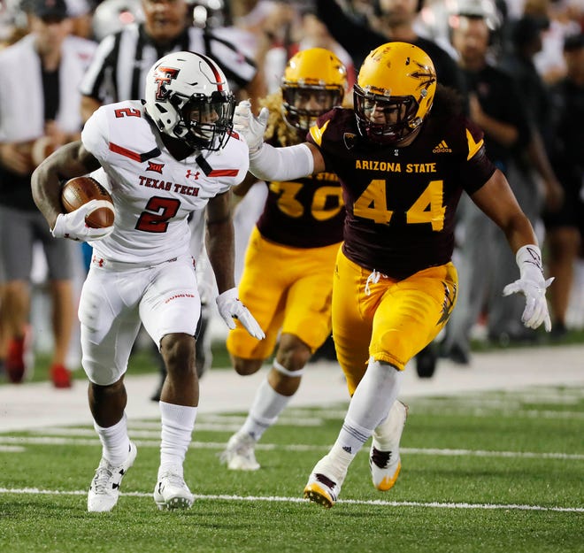 Texas Tech’s Keke Coutee carries the ball pursued by Arizona State’s Alani A.J. Latu in the first half. Texas Tech played Arizona State September 16, 2017, At Jones AT&T Stadium in Lubbock, Texas. (Mark Rogers/A-J Media for the Associated Press)