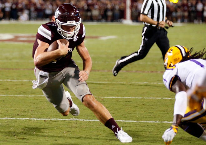 Mississippi State quarterback Nick Fitzgerald, left, runs toward the end zone for a 3-yard touchdown run while being pursued by LSU defensive back Donte Jackson (1) in Starkville, Miss., on Sept. 16, 2017. (Rogelio V. Solis/AP Photo)