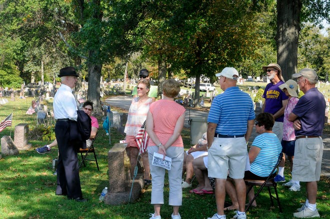 Ken Hammontree, left, portrayed Frank Goldsmith at Ashland County Historical Society's Living History Cemetery Walk Sunday at Ashland Cemetery. As a child, Goldsmith survived the sinking of the RMS Titanic in 1912.