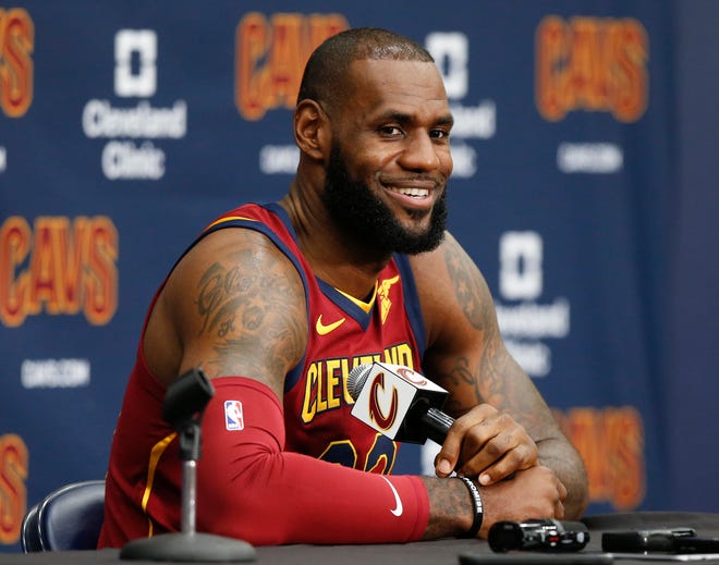 Cleveland Cavaliers’ LeBron James answers questions during the NBA basketball team media day Monday in Independence.