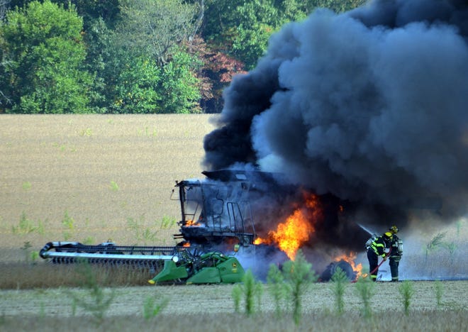 A fire destroyed the combine at Jackson and Culver roads in Bronson Township just after 4 p.m. Friday. COURTESY PHOTO