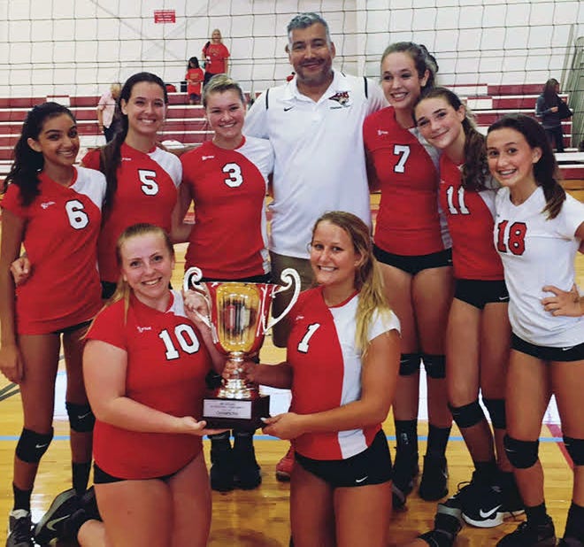 Members of the Cardinal Mooney junior varsity volleyball team pose with the trophy after winning the Area Futures Tournament on Saturday at home with a win over defending champion Venice in the final. [photo provided]
