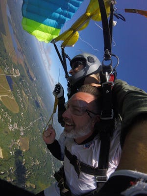 Kingston resident Brian Faghan enjoys the experience of a lifetime during the Heidrea for Heroes' Second Annual Skydive Challenge. [Courtesy photo]