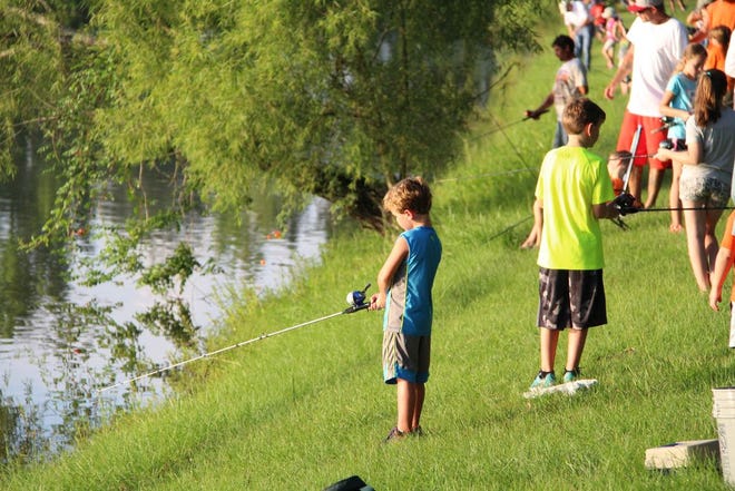 Last year, nearly 200 kids showed up for the EASL's annual Kid's Fishing Rodeo. Photo by Kyle Riviere.