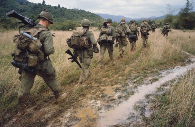 Soldiers on patrol during the Vietnam War from the 10-part PBS documentary series "The Vietnam War" by Ken Burns and Lynn Novick. [Handout/TNS]