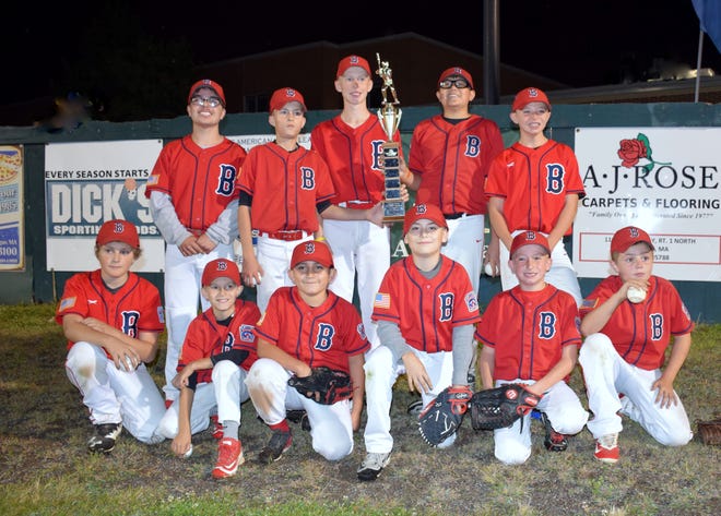 The Saugus American Little League Red Sox, the 2017 Town Major Division champions, proudly pose with the championship trophy after beating the National League champion Dodgers on Sept. 9.  The Red Sox are, from left, kneeling, Vin Penebre, Ashton Horvath, Noah Giron, Patrick Cole, Erich Schultz and Cam Preston.  Standing, David Turilli, Liam Horvath, Jake Hughes, Nathan Ing and Ricky Melanson. [Courtesy photo]
