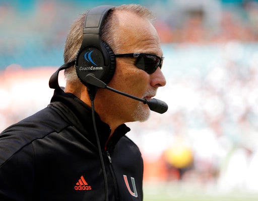 FILE - In this Sept. 2, 2017, file photo, Miami head coach Mark Richt watches during the second half of an NCAA college football game against Bethune-Cookman in Miami Gardens, Fla. Richt's Hurricanes open Atlantic Coast Conference play on Friday at Duke. (AP Photo/Lynne Sladky, File)