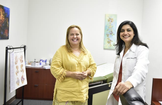 Clinic director Ruta Jouniari, left, with medical director Dr. Shahnaz Ahmed at the Universal Crescent Clinic. The free, volunteer-run medical clinic that serves the uninsured in Sarasota is opening a mobile clinic to help the people of Immokalee. [Herald-Tribune staff photo / Thomas Bender]