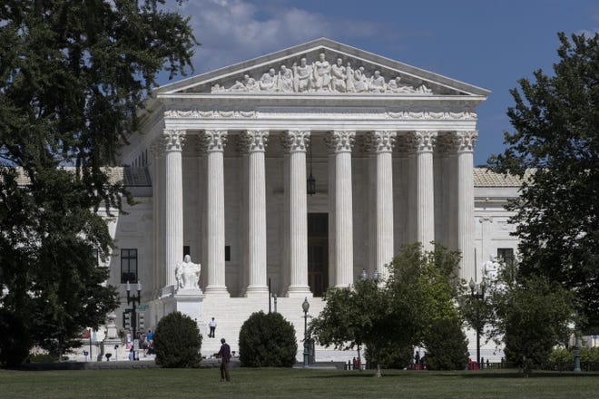 In this June 26, 2017 photo, The Supreme Court is seen in Washington. A Supreme Court with a reconstituted conservative majority is taking on a new case with the potential to financially cripple Democratic-leaning labor unions that represent government workers. The justices deadlocked 4-4 in a similar case last year. (AP Photo/J. Scott Applewhite)