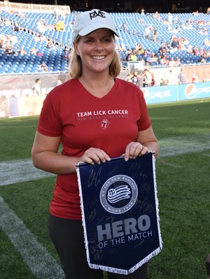 Eve Schluter, of Maynard, was recognized on Sept. 23 at Gillette Stadium by the New England Revolution as Hero of the Match for her involvement with the Pan-Mass Challenge.

[Courtesy photo]