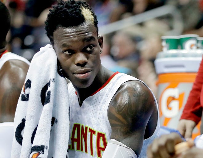 In this March 8, 2017, file photo, Atlanta Hawks' Dennis Schroder sits on the bench during the second quarter of a game against the Brooklyn Nets in Atlanta, Ga. Schroder has been charged with battery after a fight at a late-night restaurant. [AP PHOTO]