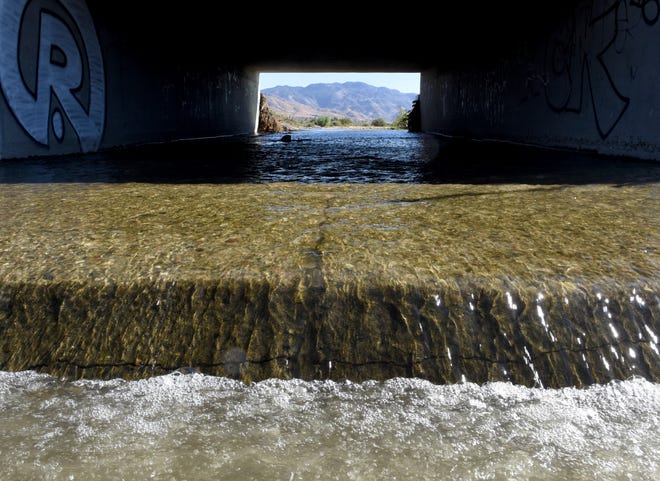 Water flows through the Mojave River in Hesperia on Friday. The California WaterFix, an ambitious $17 billion project in Northern California, would increase the long-term average water supply to the Mojave Water Agency. [James Quigg, Daily Press]