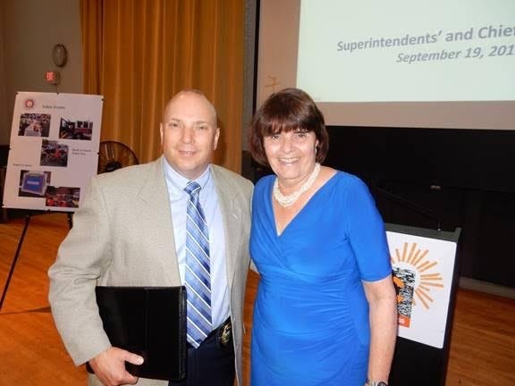 Medford Police Department Lt. Paul Covino, left, poses with Middlesex District Attorney Marian Ryan during the annual Superintendents and Chiefs Breakfast. [Courtesy Photo]