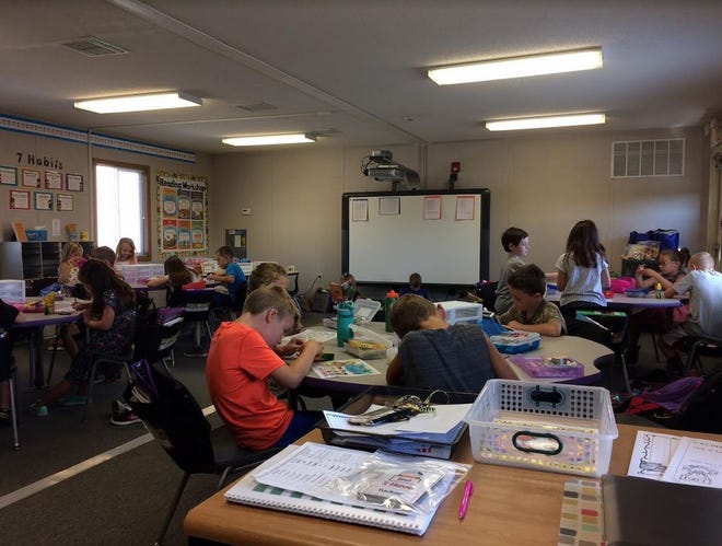 PHOTO COURTESY OF CENTRAL SCHOOL DISTRICT Central Primary School second-graders work in a modular classroom. There are 138 second-graders in six sections at the school. Four sections are in modular classrooms.
